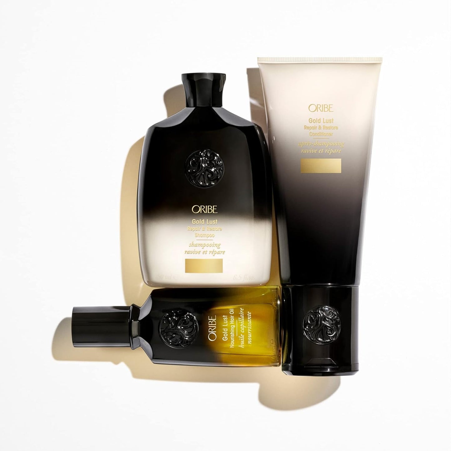 Champú reparador y restaurador Gold Lust de ORIBE 250ml.