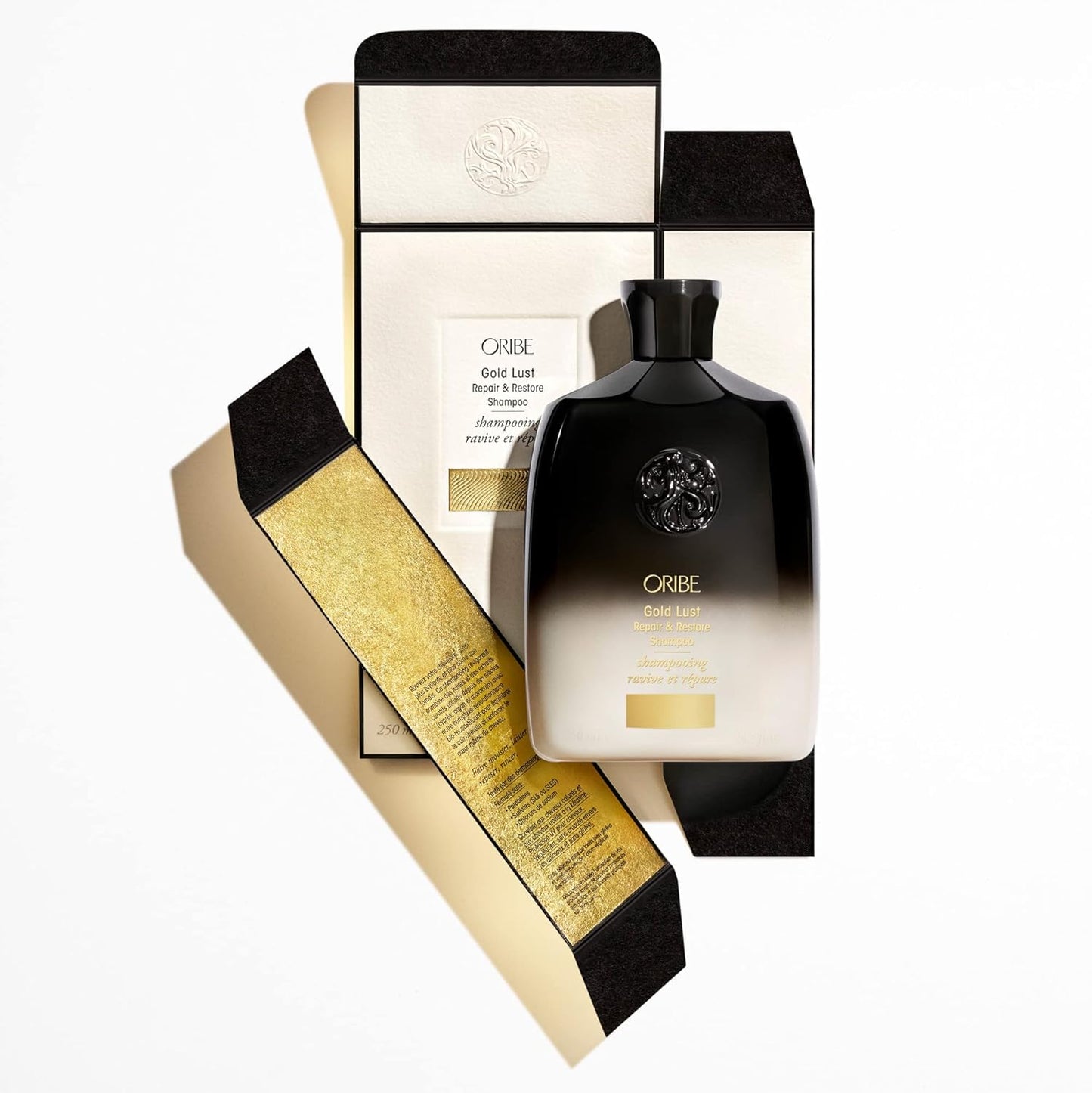 Champú reparador y restaurador Gold Lust de ORIBE 250ml.