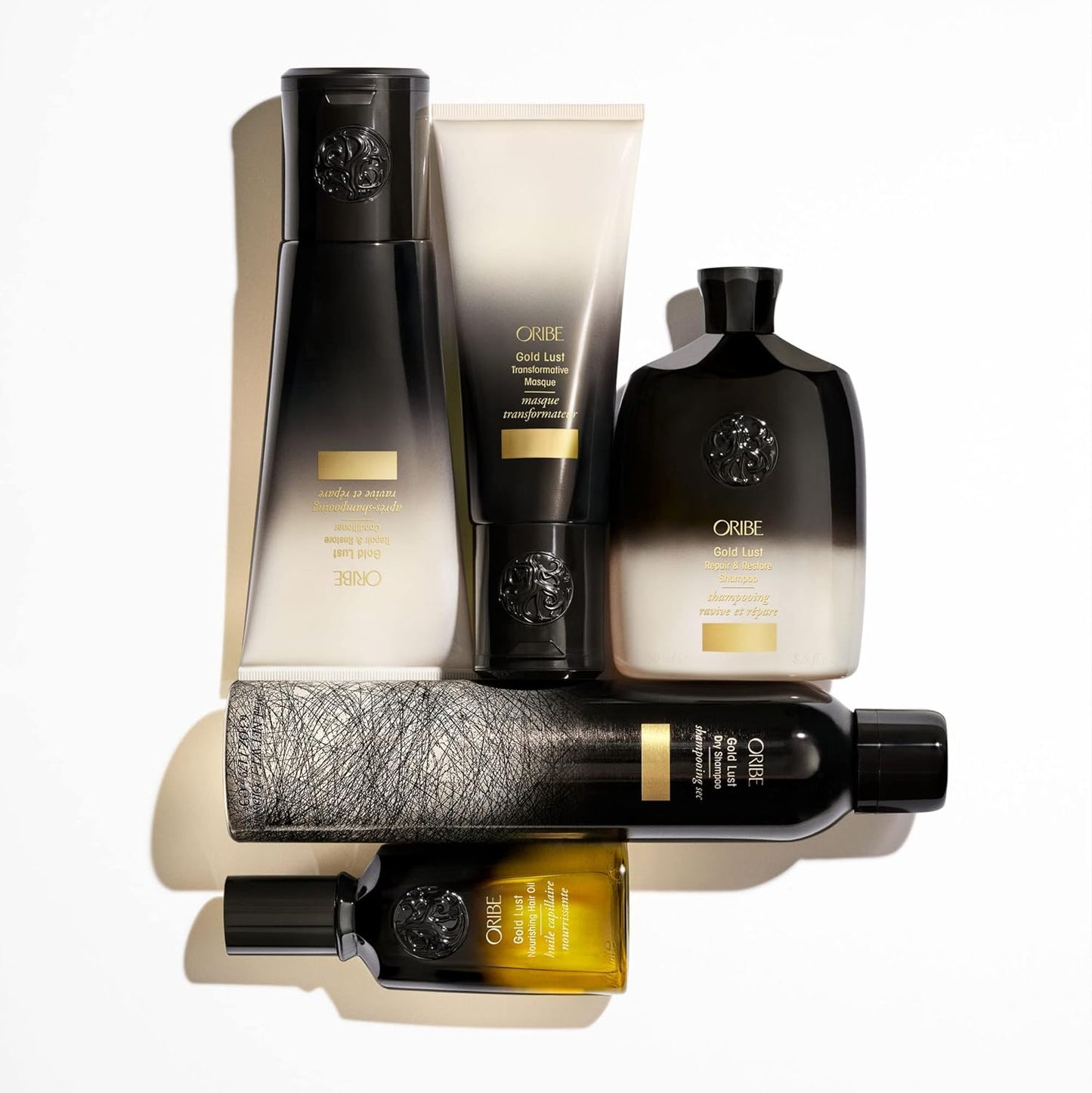 Champú reparador y restaurador Gold Lust de ORIBE 250ml.